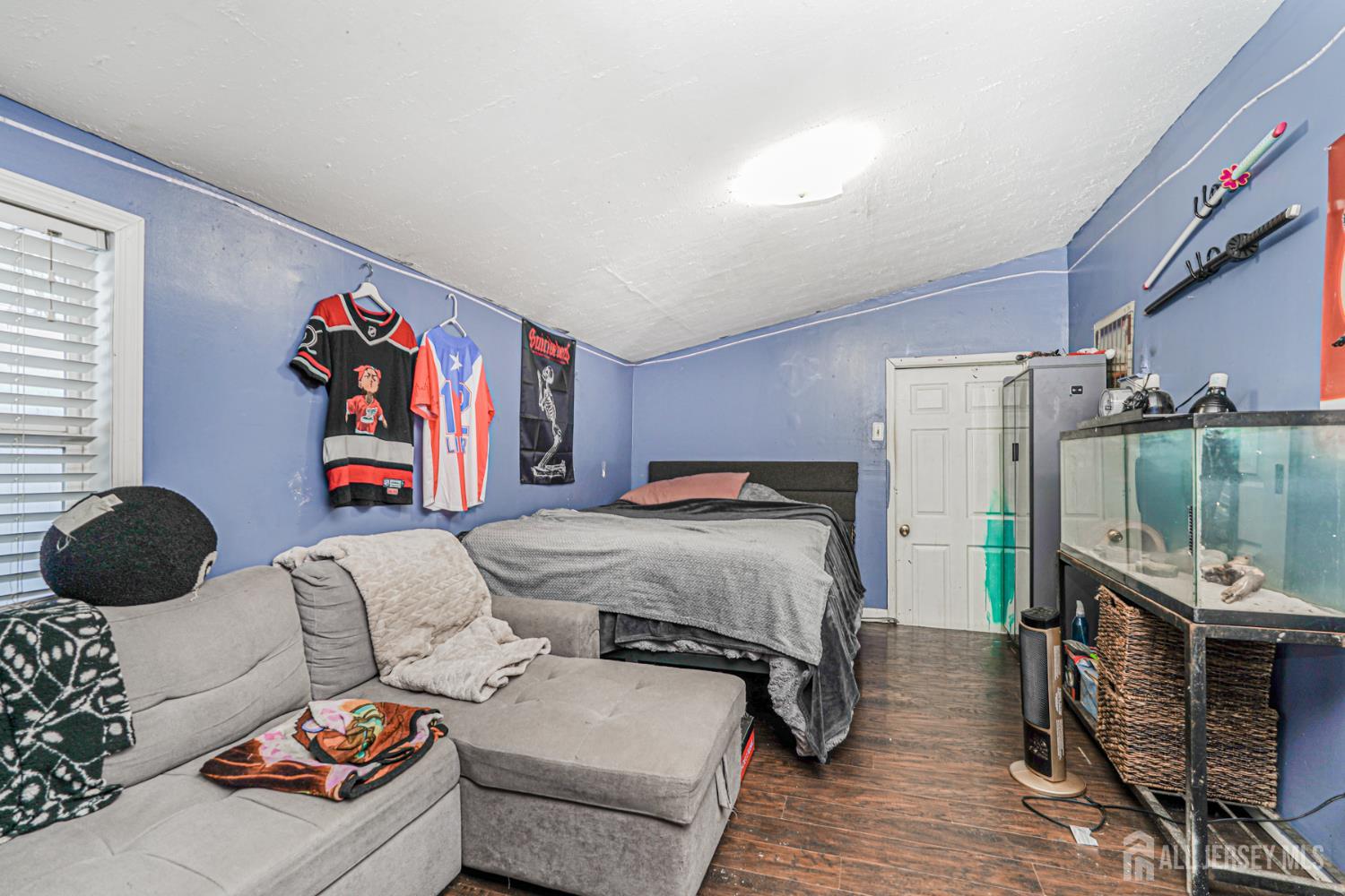 7 Walnut Lane Parlin, NJ 08859 - Photo 18 of 23 a bedroom with furniture and a couch