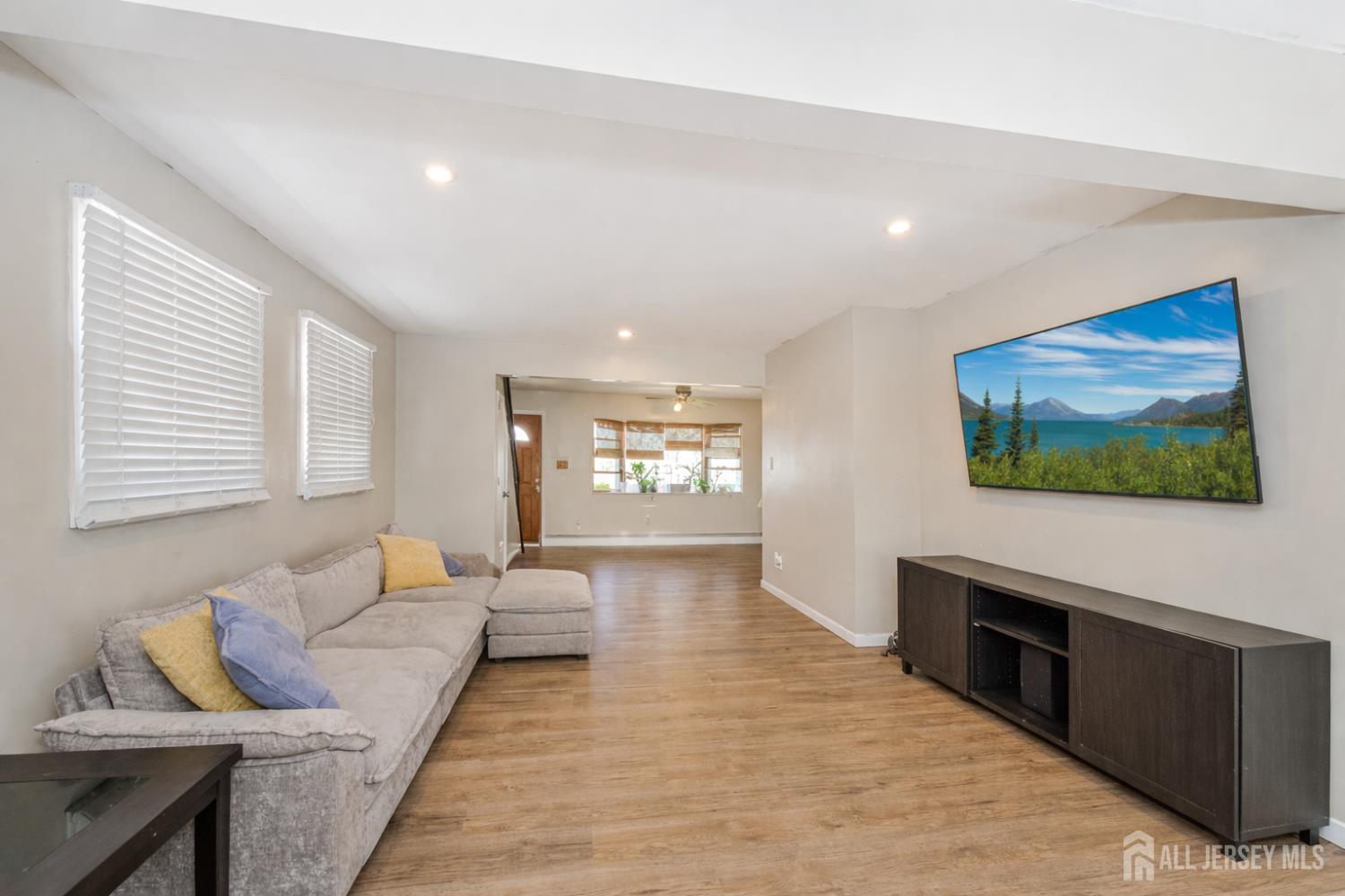 7 Walnut Lane Parlin, NJ 08859 - Photo 5 of 22 a living room with furniture and a flat screen tv