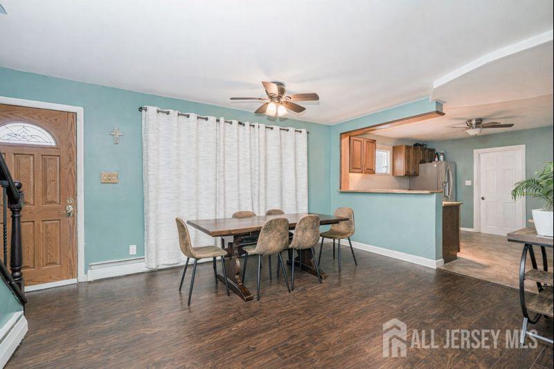 7 Walnut Lane Parlin, NJ 08859 - Photo 6 of 23 a view of a dining room with furniture and chandelier