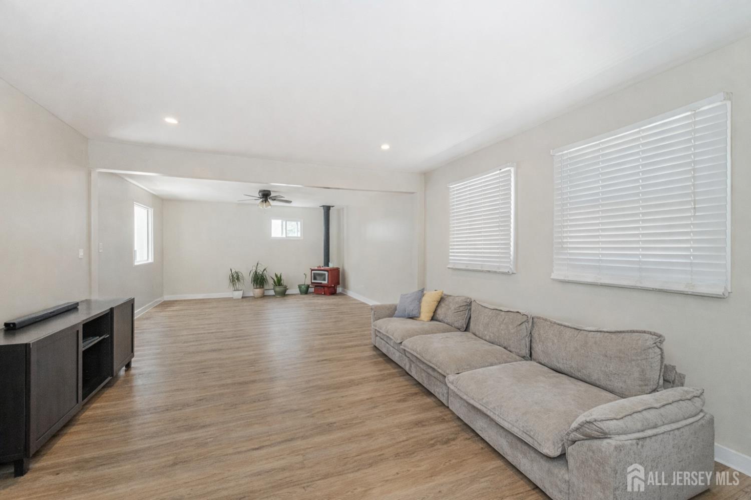 7 Walnut Lane Parlin, NJ 08859 - Photo 6 of 22 a living room with furniture and a hard wood floor