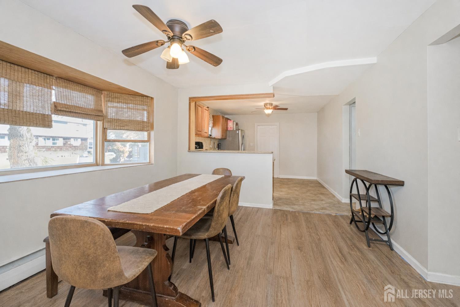 7 Walnut Lane Parlin, NJ 08859 - Photo 8 of 22 a view of a dining room with furniture and a chandelier