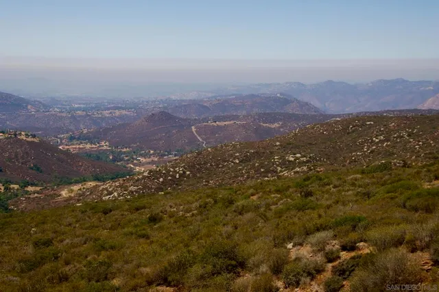 a picture of a bathroom with a shower