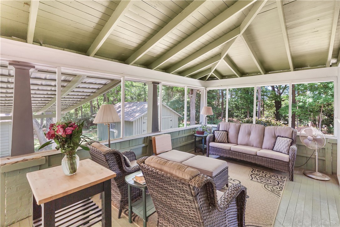 205 West Mauldin Street Walhalla, SC 29691 - Photo 29 of 43 A delightful screened porch, with pitched ceilings, offers a serene woodland panorama.