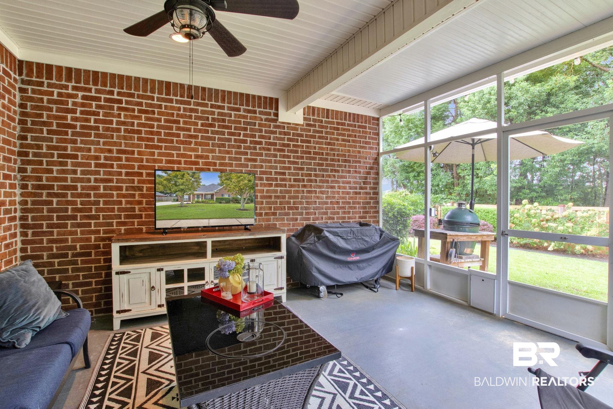 9478 Autauga Bend Daphne, AL 36526 - Photo 32 of 73 Sunroom featuring plenty of natural light, ceiling fan, and beam ceiling