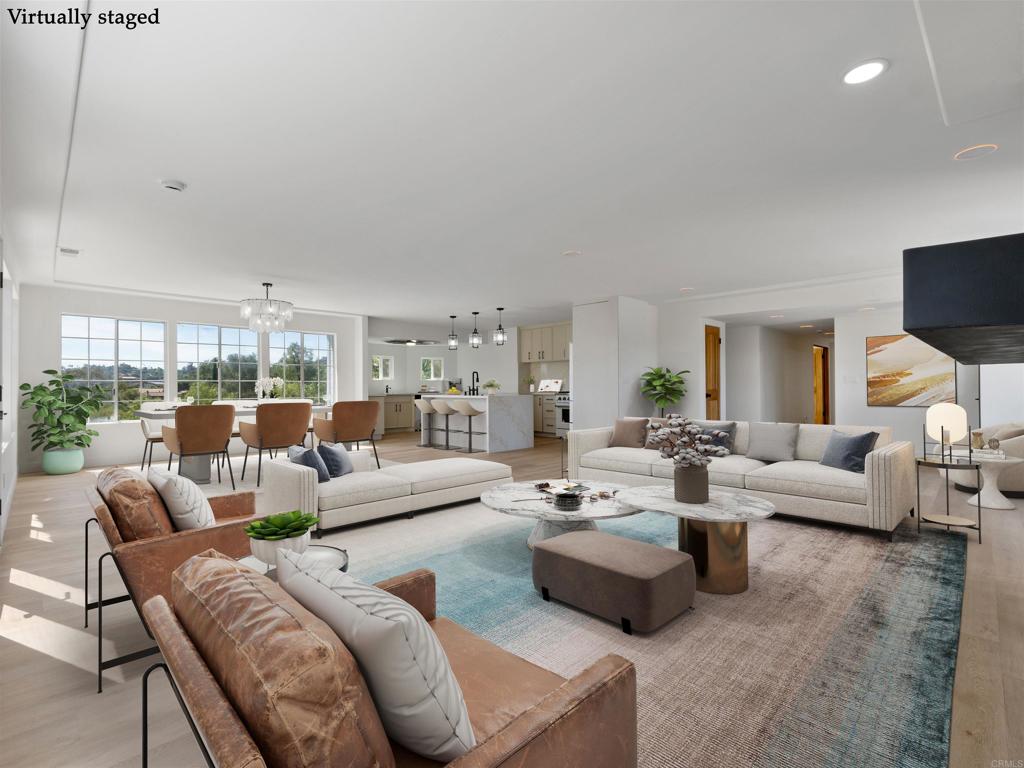 28148 Mountain Meadow Road Escondido, CA 92026 - Photo 15 of 51 a living room with furniture white walls and a large window