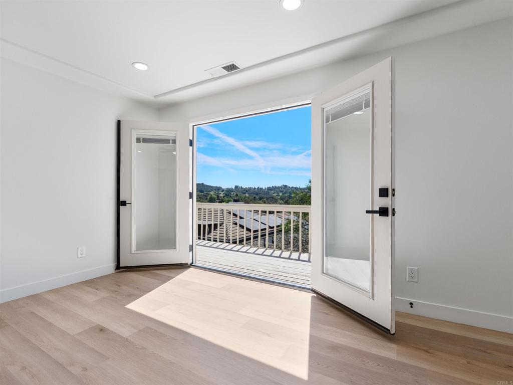 28148 Mountain Meadow Road Escondido, CA 92026 - Photo 23 of 51 a view of a room with a large window