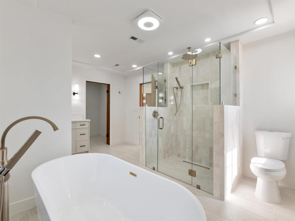 28148 Mountain Meadow Road Escondido, CA 92026 - Photo 28 of 51 a bathroom with a sink a toilet and shower