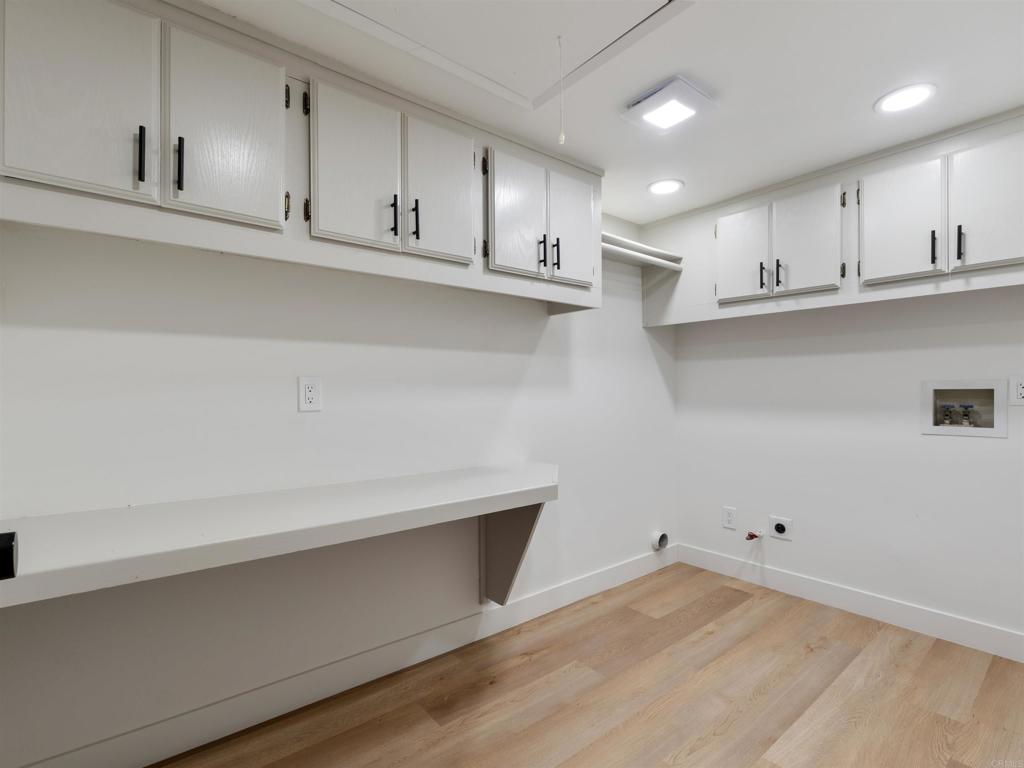 28148 Mountain Meadow Road Escondido, CA 92026 - Photo 36 of 51 a view of kitchen with wooden cabinet