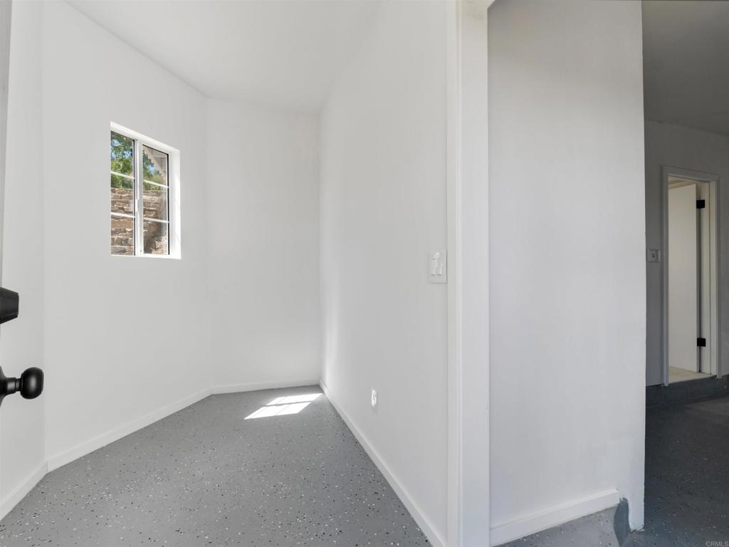 28148 Mountain Meadow Road Escondido, CA 92026 - Photo 41 of 51 an entryway of a house with windows