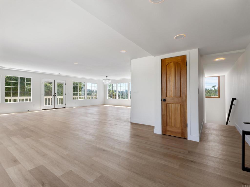 28148 Mountain Meadow Road Escondido, CA 92026 - Photo 5 of 51 a view of a livingroom with wooden floor