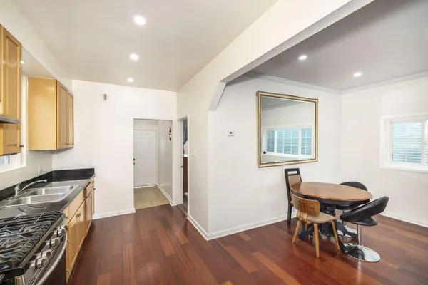 a livingroom with furniture and wooden floor