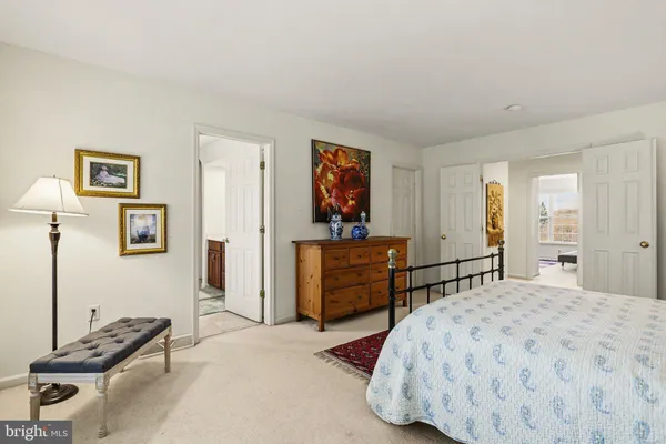 a bedroom with a bed and furniture