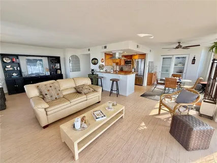 a bathroom with a shower sink vanity mirror and toilet