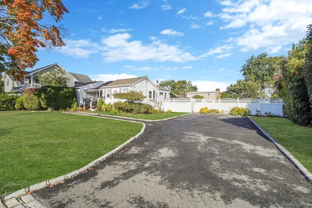 a view of a street with a houses