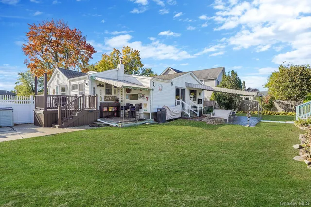 a view of a house with a back yard