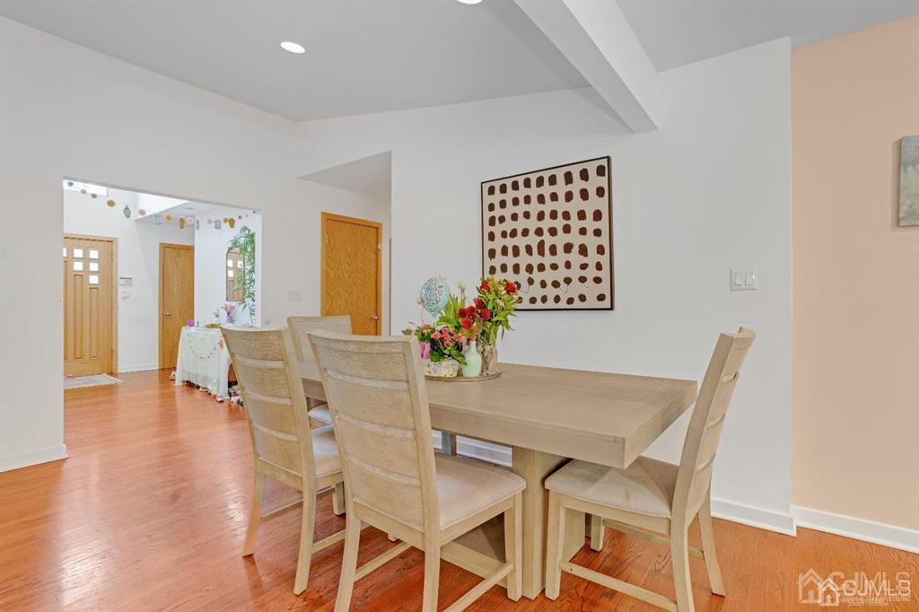 3 Clive Hills Road Edison, NJ 08820 - Photo 14 of 39 a view of a dining room with furniture and wooden floor
