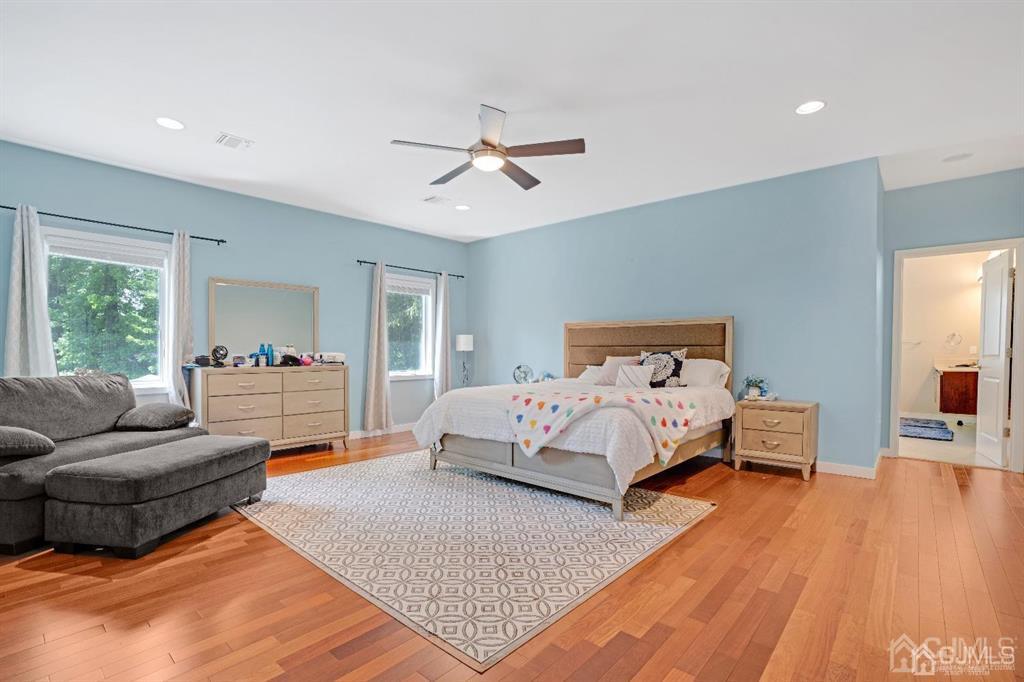 3 Clive Hills Road Edison, NJ 08820 - Photo 27 of 39 a bedroom with a bed and couch
