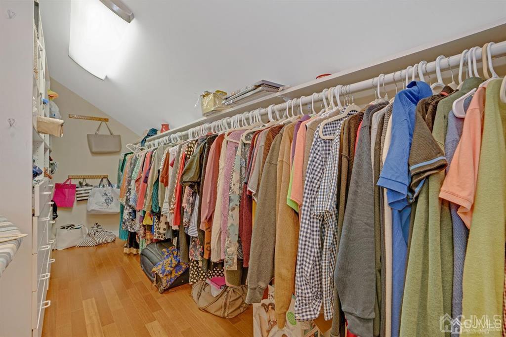 3 Clive Hills Road Edison, NJ 08820 - Photo 30 of 39 a view of walk in closet with clothes