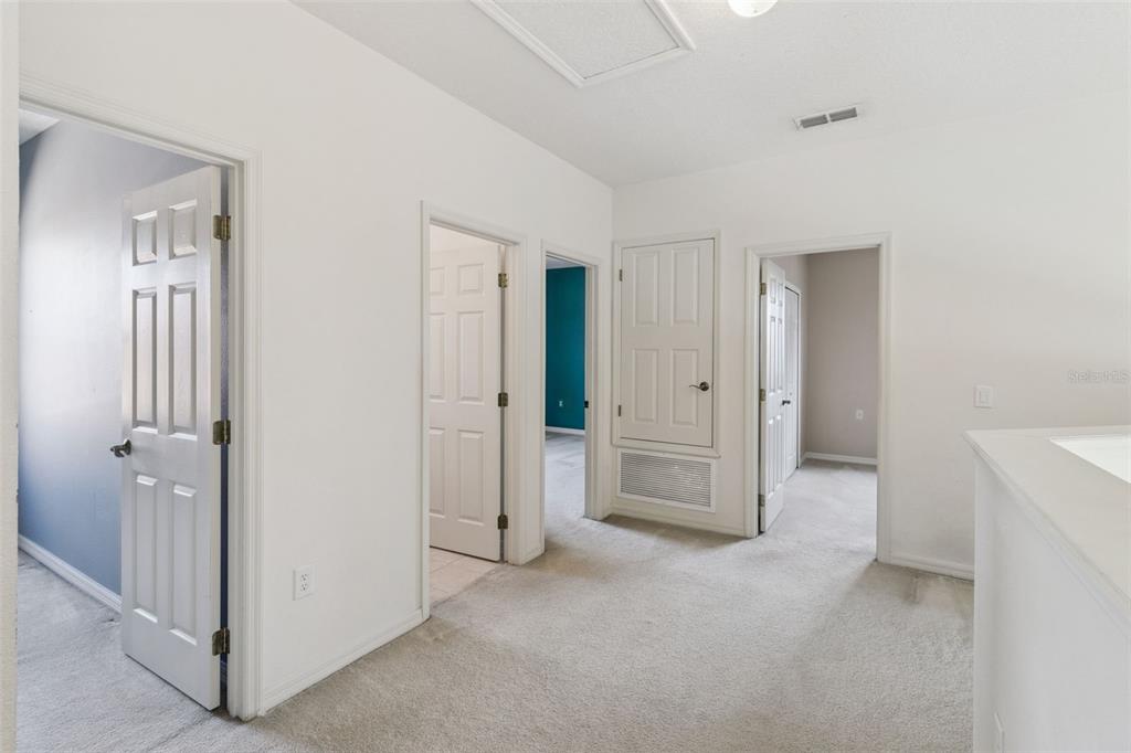 3643 Peaceful Valley Drive Clermont, FL 34711 - Photo 42 of 52 wooden floor and closet area in a room