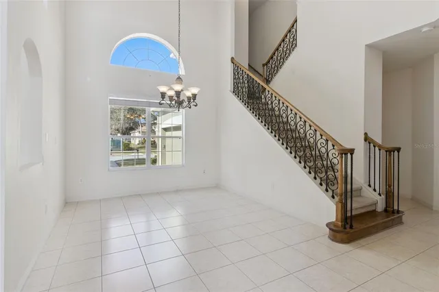 a view of a livingroom with a dinning table and chair