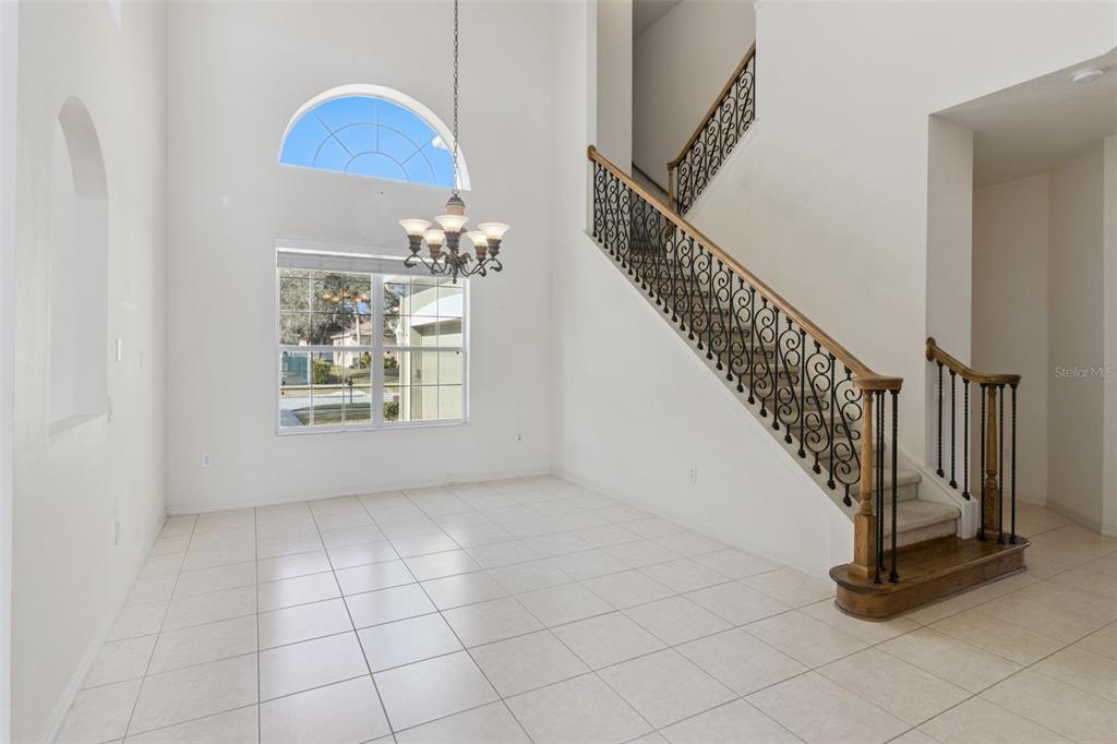 3643 Peaceful Valley Drive Clermont, FL 34711 - Photo 7 of 52 a view of entryway and hall with wooden floor