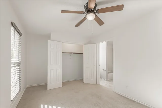 a bathroom with a sink mirror and a bathtub