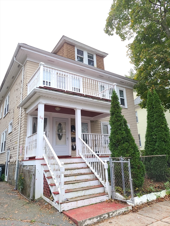 64 Stockton Street Boston, MA 02124 - Photo 2 of 27 a front view of a house with a porch