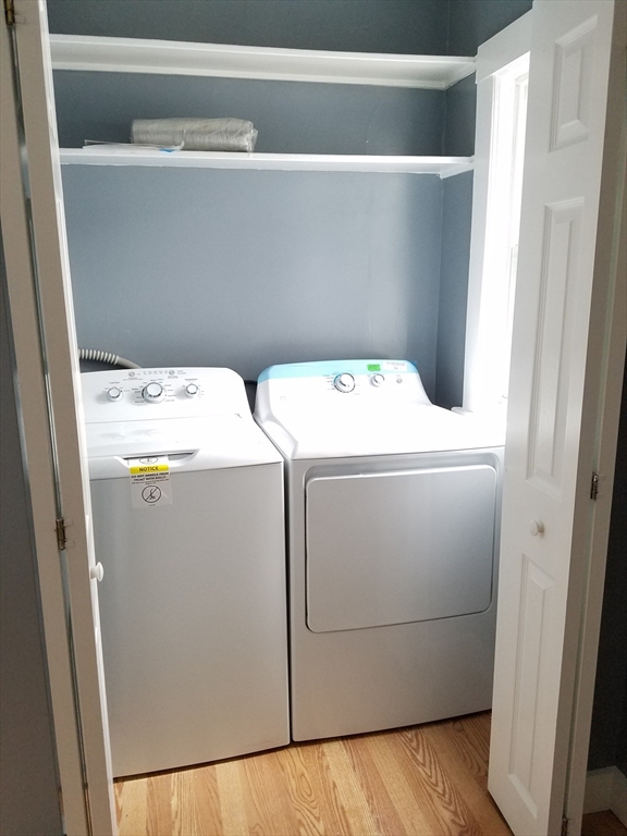 64 Stockton Street Boston, MA 02124 - Photo 21 of 27 a utility room with dryer and washer
