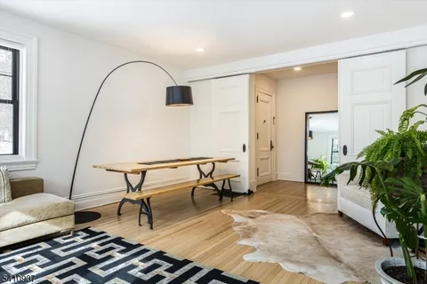 a living room with patio furniture