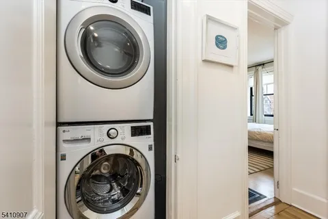 a view of livingroom with washer and dryer