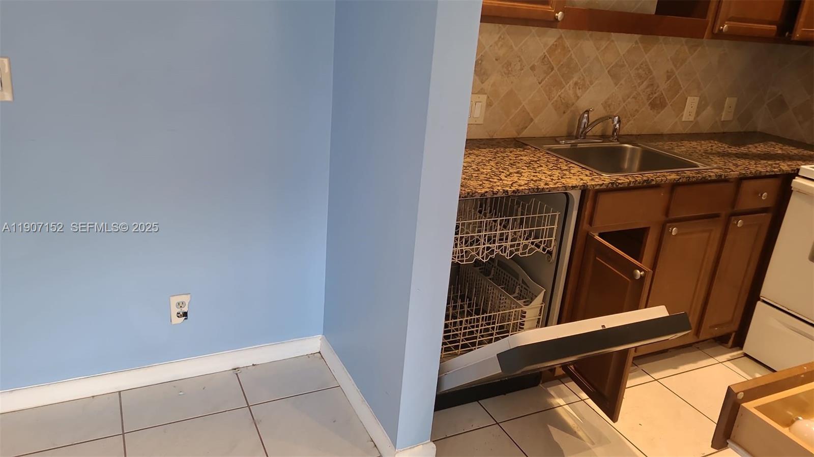 534 Mansfield M, Unit 534 Boca Raton, FL 33434 - Photo 12 of 52 a view of utility room