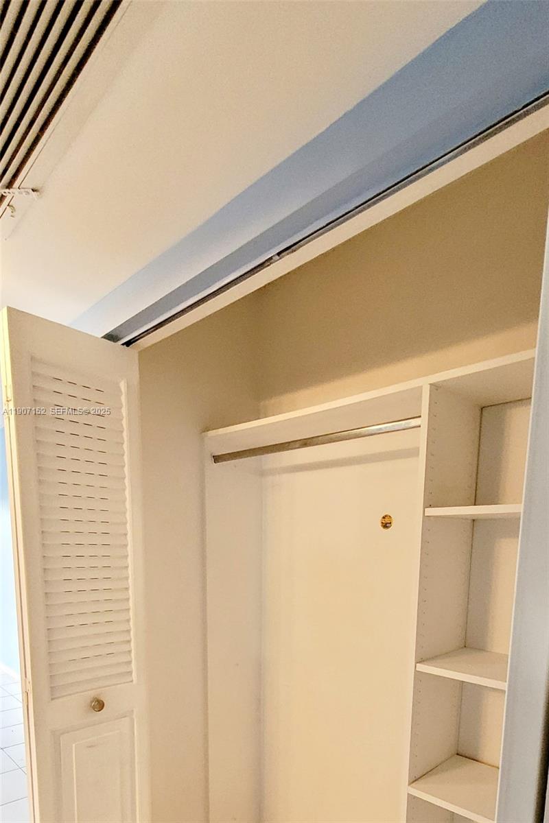 534 Mansfield M, Unit 534 Boca Raton, FL 33434 - Photo 15 of 52 a close up of a shower and a door