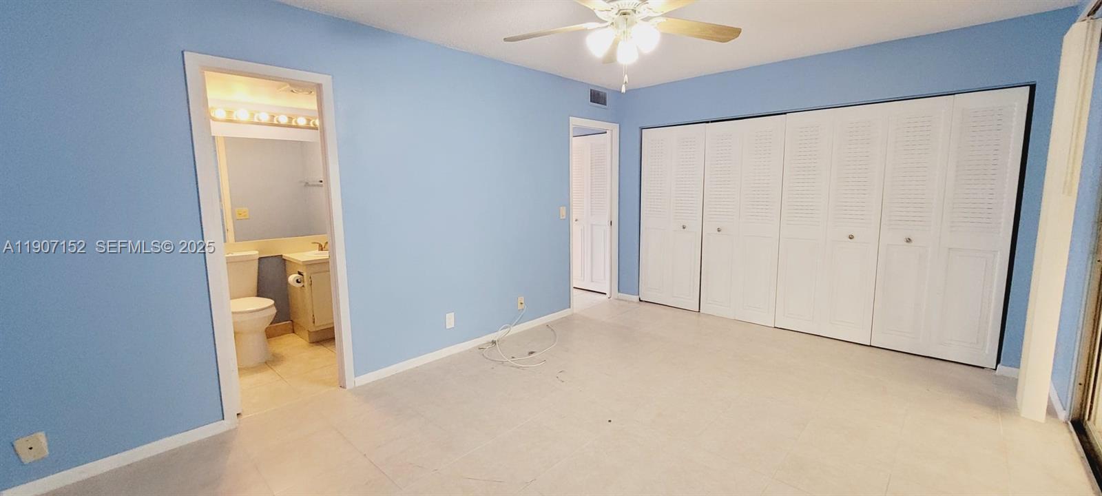534 Mansfield M, Unit 534 Boca Raton, FL 33434 - Photo 18 of 52 a view of an empty room with a bathroom