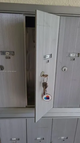 a bathroom with a shower and a sink