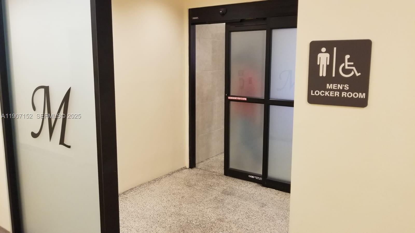 534 Mansfield M, Unit 534 Boca Raton, FL 33434 - Photo 29 of 52 a view of a kitchen with a refrigerator