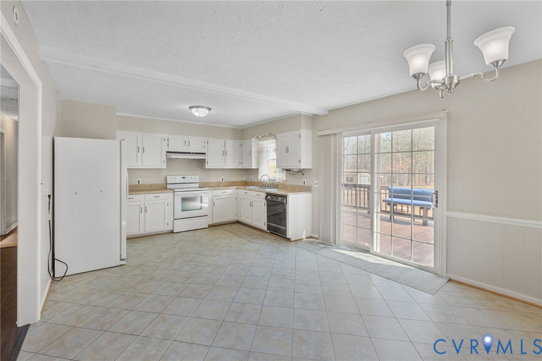 270 Long Acre Road Palmyra, VA 22963 - Photo 5 of 19 a kitchen with stainless steel appliances a refrigerator sink and cabinets