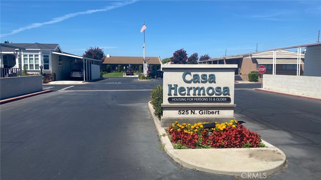 a view of outdoor kitchen with outdoor seating