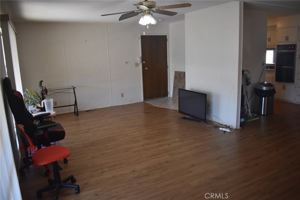 525 North Gilbert, Unit 106 Anaheim, CA 92801 - Photo 10 of 18 a view of a workspace with furniture and wooden floor