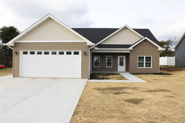 a view of front a house with a yard