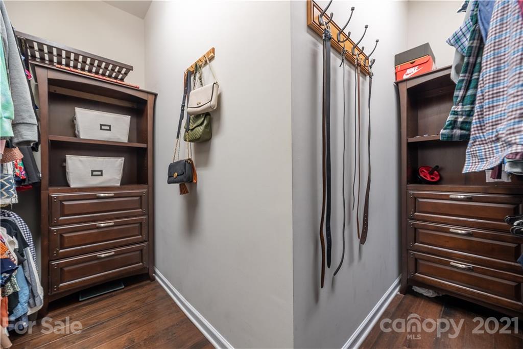 8049 Bryson Road, Unit 117 Indian Land, SC 29707 - Photo 28 of 40 a view of bedroom and hallway