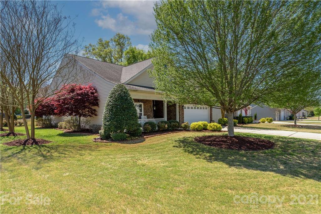 8049 Bryson Road, Unit 117 Indian Land, SC 29707 - Photo 4 of 40 a view of a house with a yard and tree s