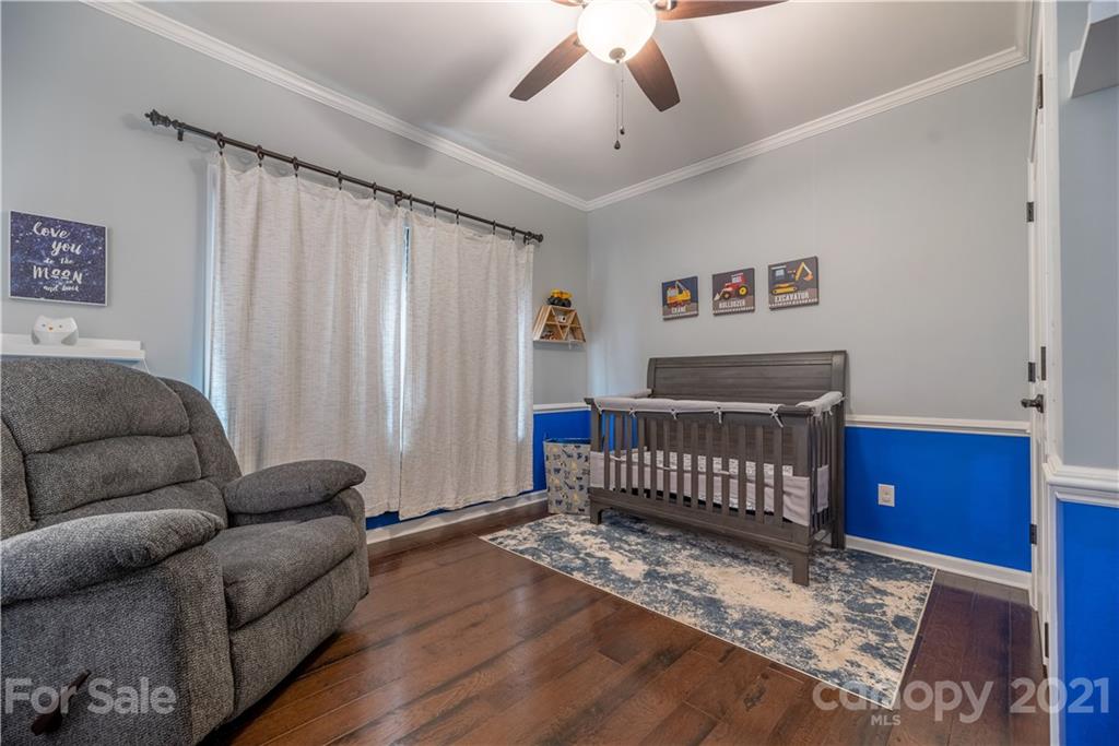 8049 Bryson Road, Unit 117 Indian Land, SC 29707 - Photo 34 of 40 a living room with furniture and a window