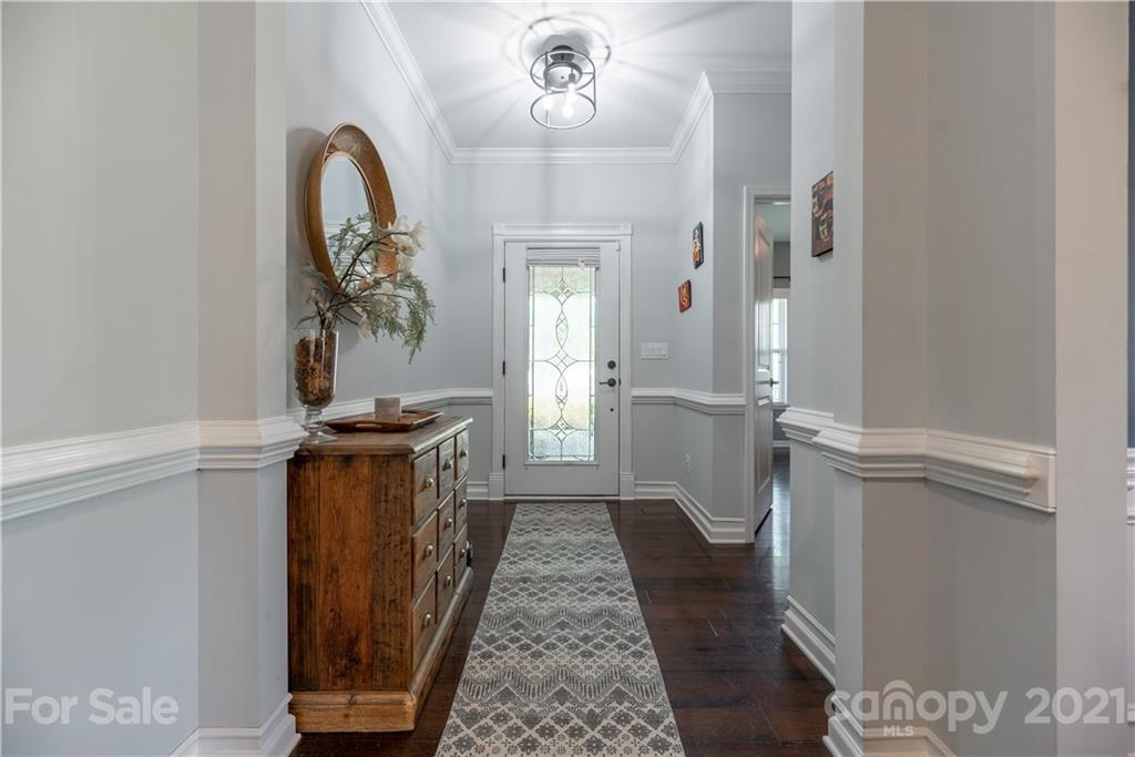 8049 Bryson Road, Unit 117 Indian Land, SC 29707 - Photo 7 of 40 view of a hallway with a washer and dryer