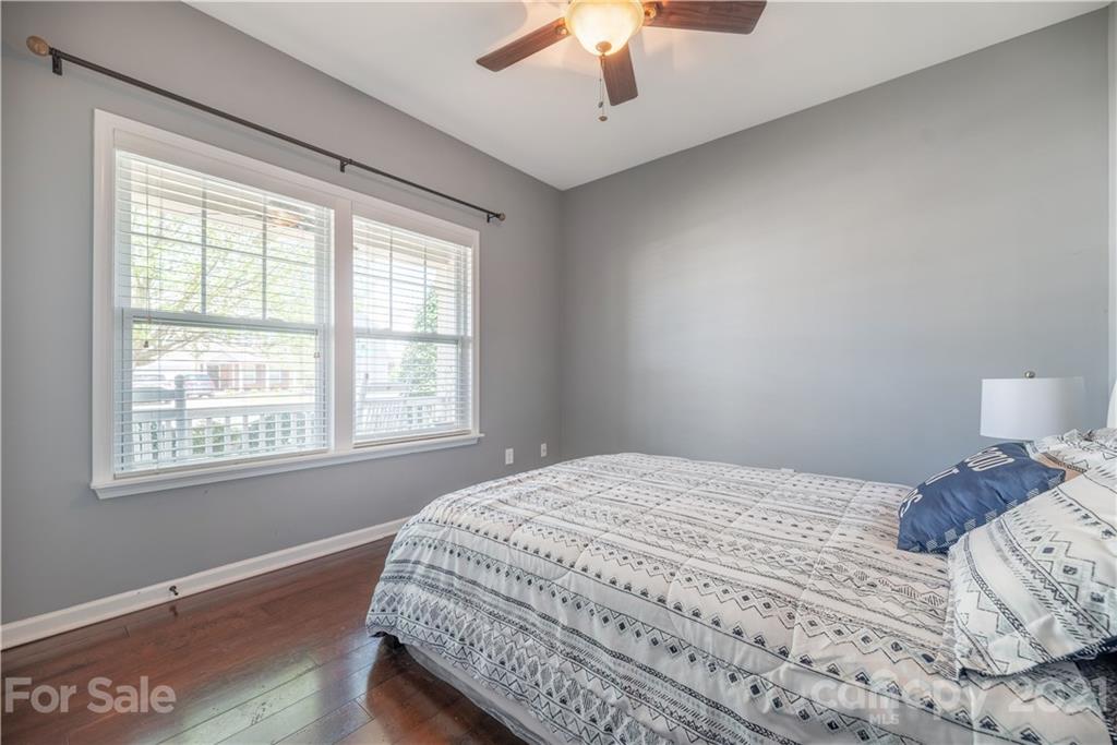 8049 Bryson Road, Unit 117 Indian Land, SC 29707 - Photo 8 of 40 a bedroom with a bed and a window