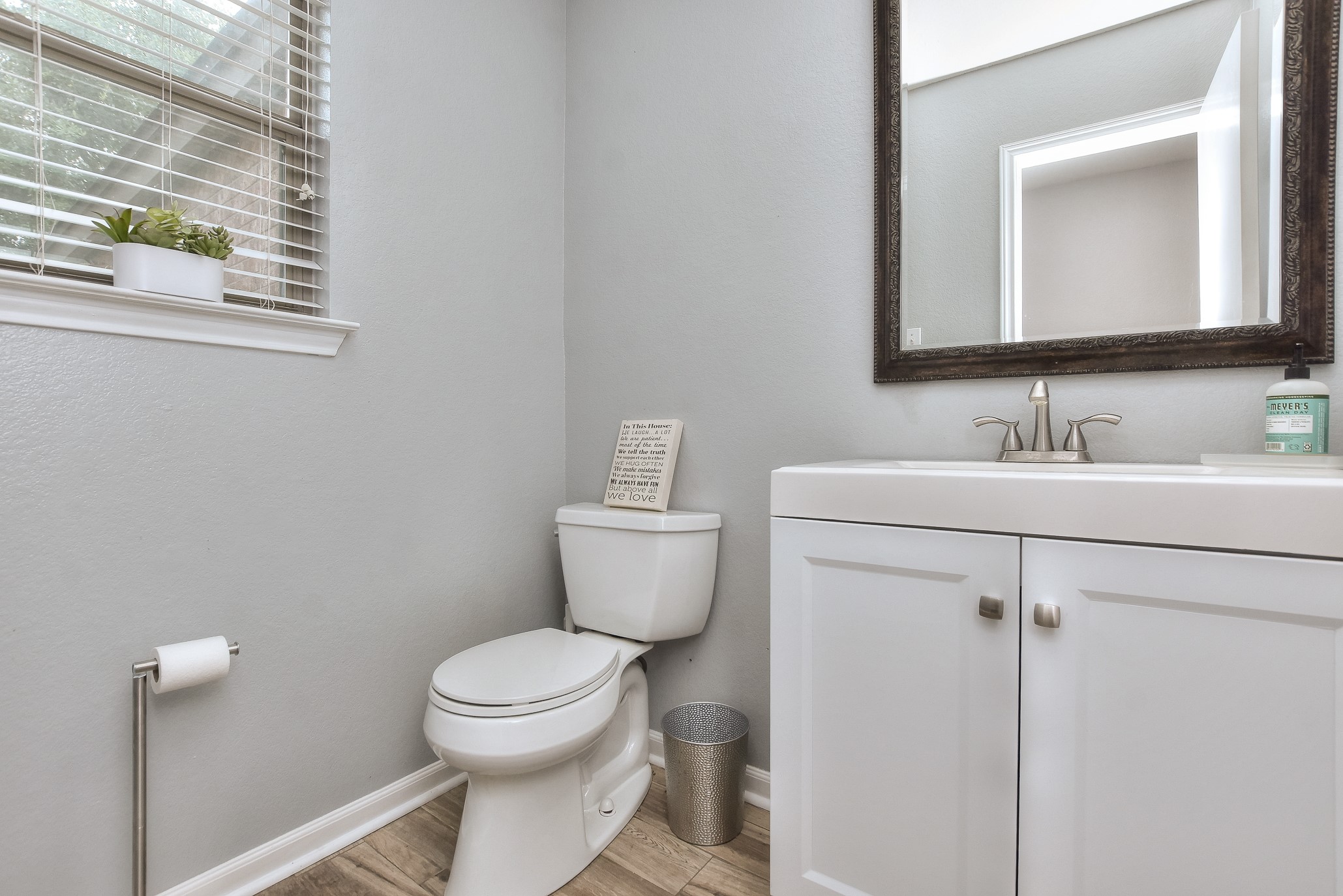 74 Jan Lane Georgetown, TX 78626 - Photo 22 of 31 a bathroom with a toilet sink and mirror