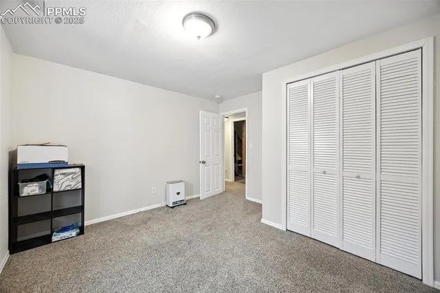an empty room with a closet