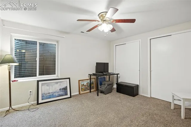 a view of workspace with furniture and natural light