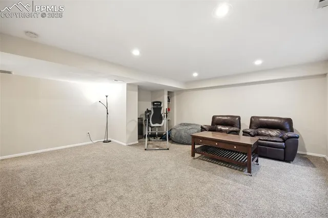 a view of a livingroom with furniture