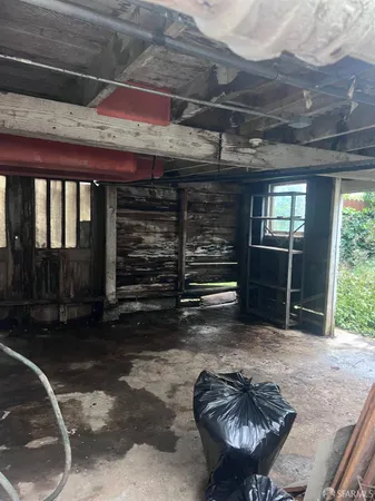 a room with furniture and a ceiling fan