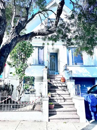 a front view of a house with a porch